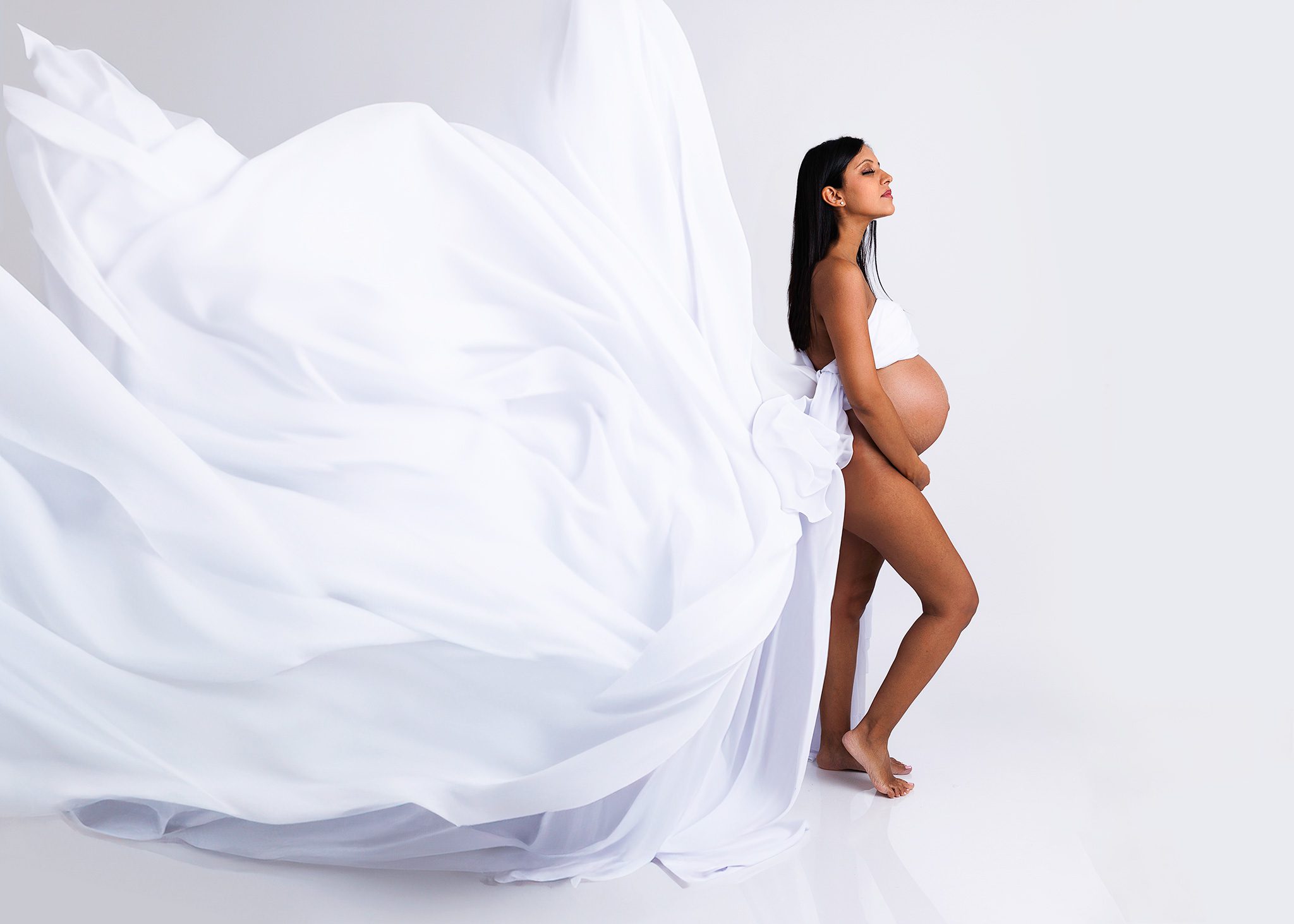 maternity photography with white floaty dress in woking