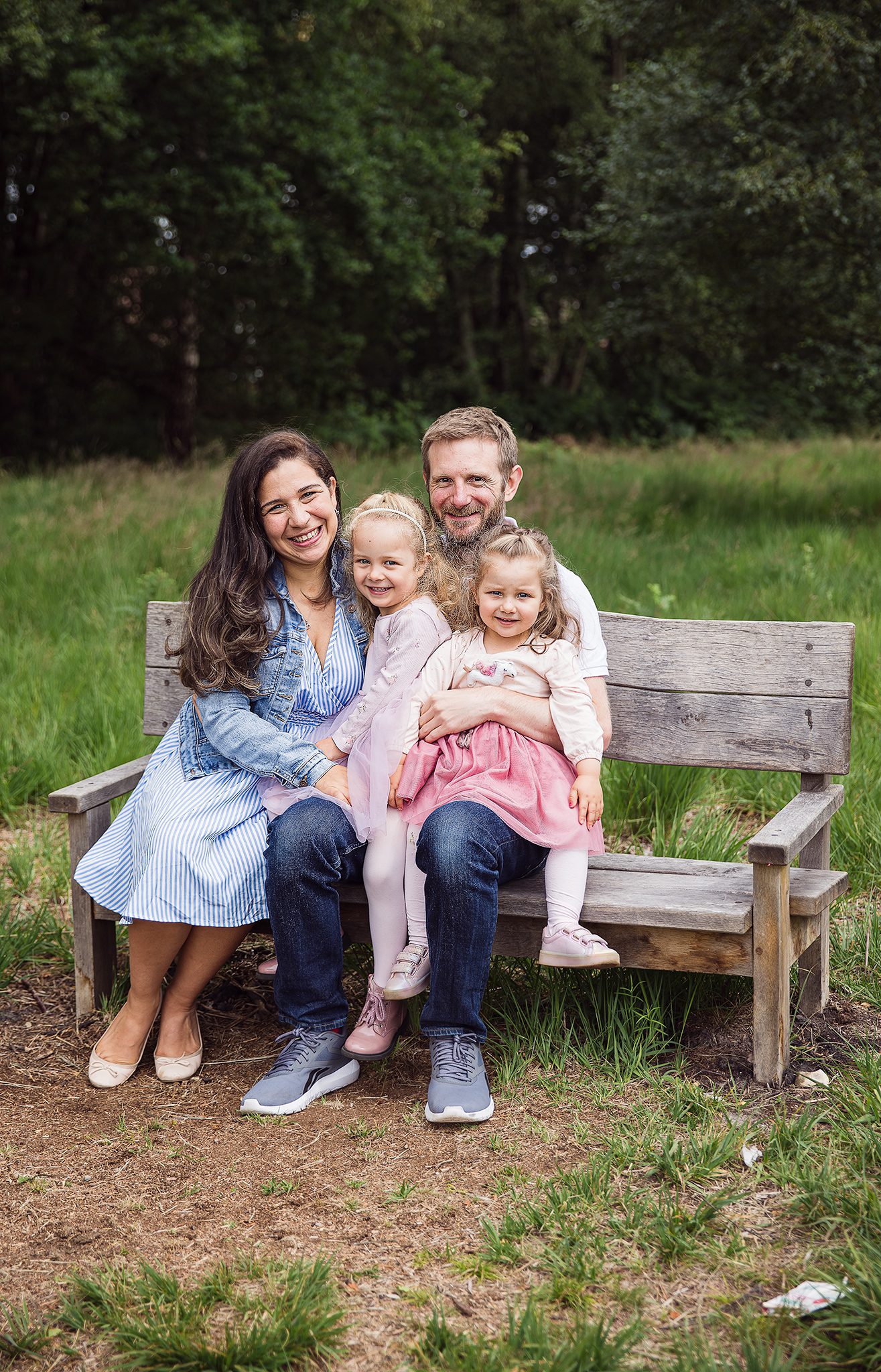 Family of 4 outside woodland photoshoot